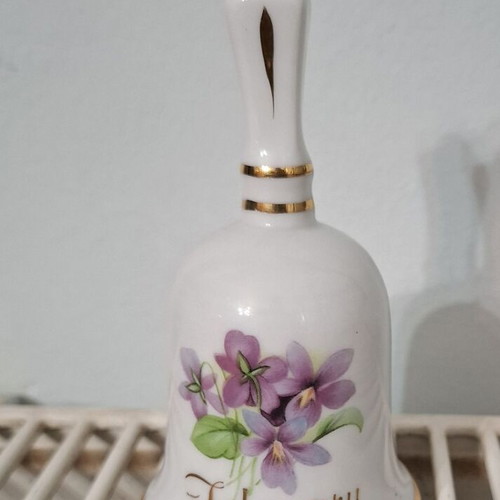 Vintage porcelain bell with February theme like new