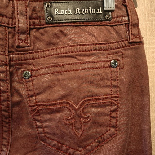 Rock Revival women's low rise red snake embossed denim jeans used