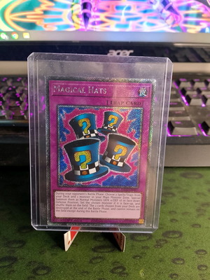 Magical Hats Yu-Gi-Oh! card new, 1st Edition, Platinum Secret Rare