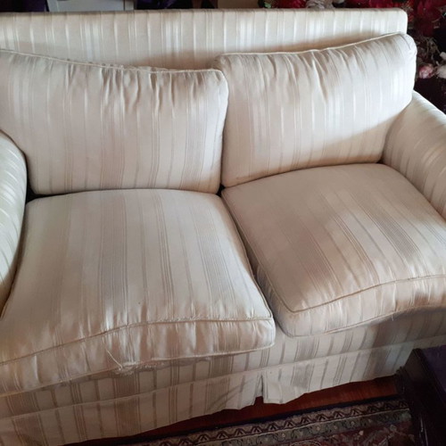 Two-seater sofa used 1.40x0.85 m with silk-cotton filling