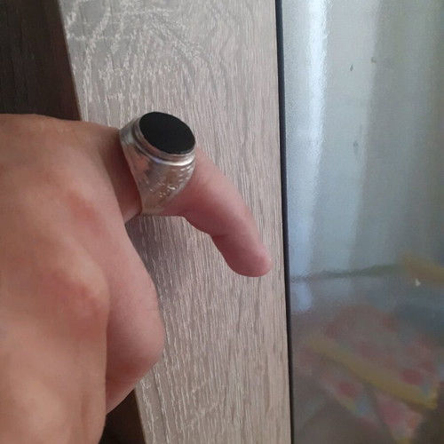 Silver ring with black stone like new
