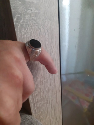 Silver ring with black stone like new