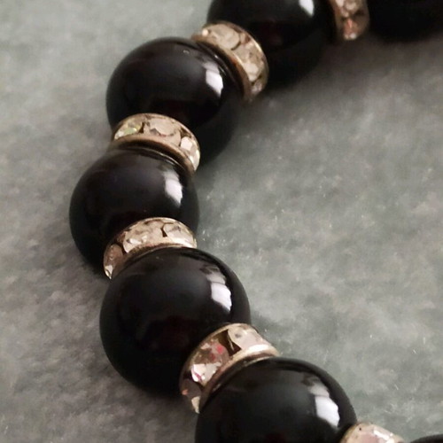 Bracelet with black beads and white crystals like new