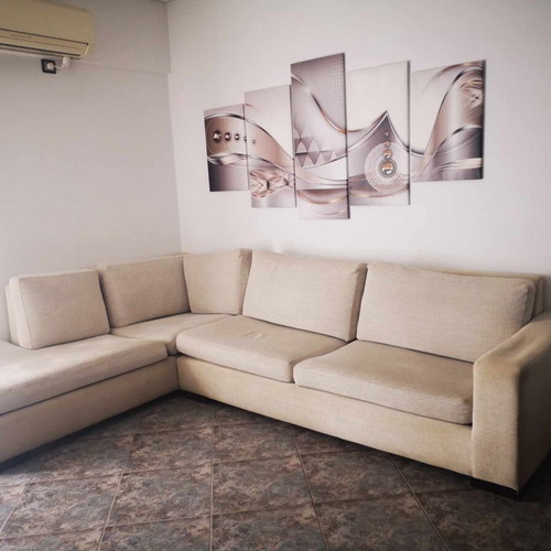 Corner sofa used 2.15x3.00 beige, two pieces