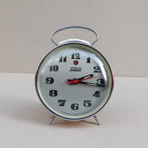 Metal wind-up vintage alarm clock