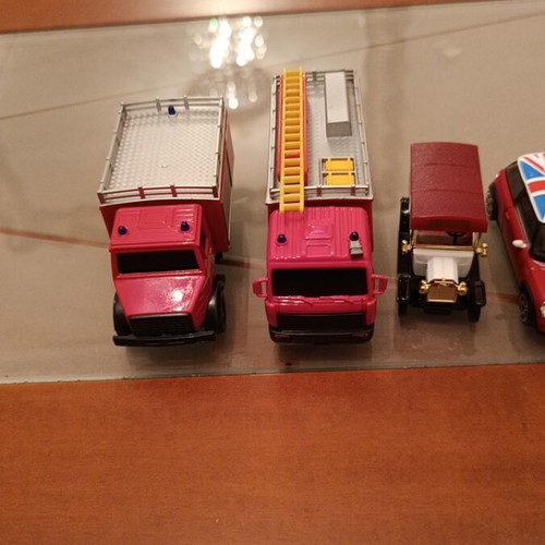 Toy vehicles used, fire trucks, cars, van