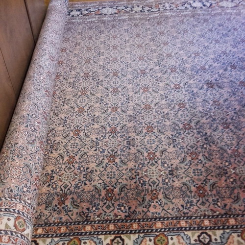 Handmade wool rug used, approximately 10 sqm