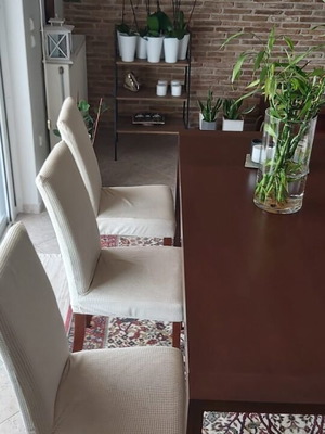 Solid wood dining set with six extendable chairs
