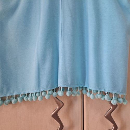 Sleeveless top new turquoise with pon pon