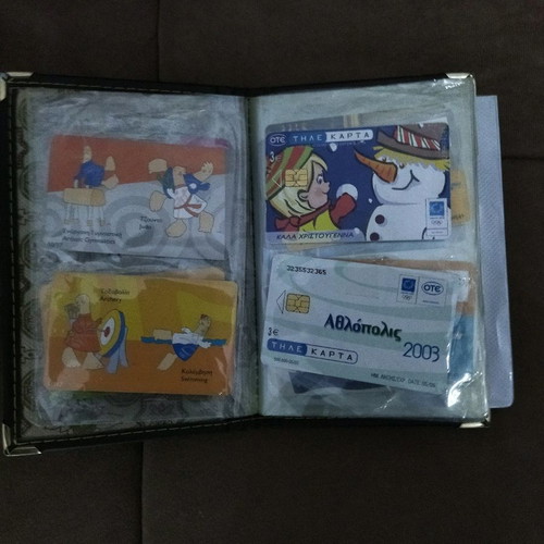 Collectible old phone cards with album used