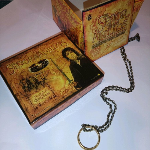 Lord of the Rings ring used with chain, box, and book