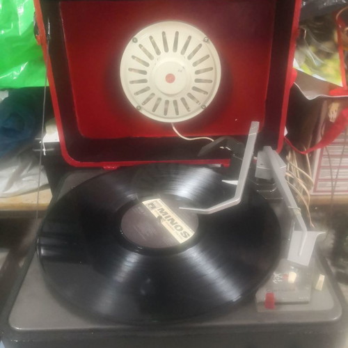 Red Garrard collectible pick up used with built-in speaker