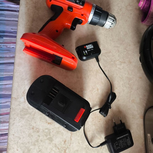 Black and Decker EPC18 electric screwdriver used with battery and charger