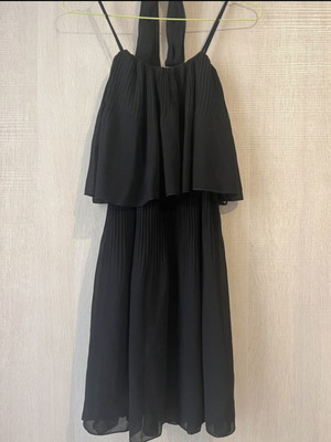 Black Mini Dress like new with ruffles and straps, sizes S-M