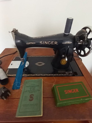 Singer sewing machine used with table
