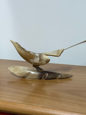 Decorative bird used with small break on tail