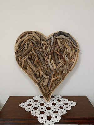 Handmade decorative heart with driftwood