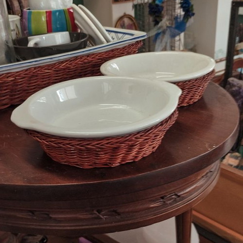 Vintage ceramic serving plates like new with wicker bases
