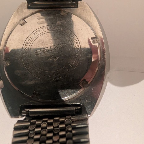 Seiko wristwatch with 7019 movement and embossed globe logo