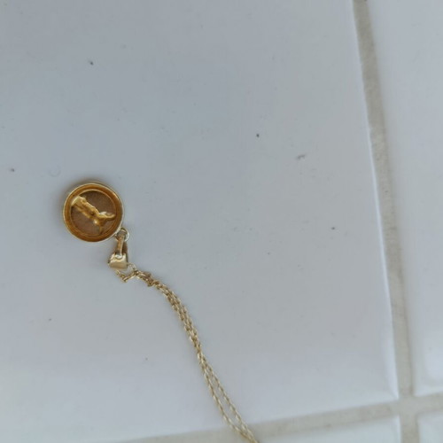 Gold-plated necklace with Nike of Samothrace pendant, like new