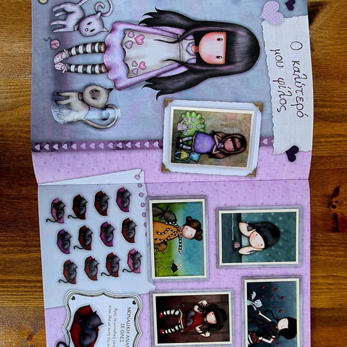 Santoro sticker album used with 8 missing stickers and correctly placed