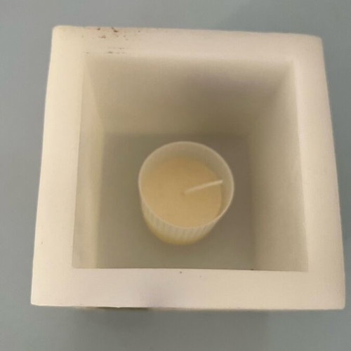 Decorative candle in wax pot new