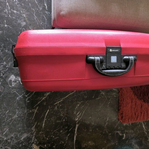 Delsey suitcase like new, large, red, 68x55 cm