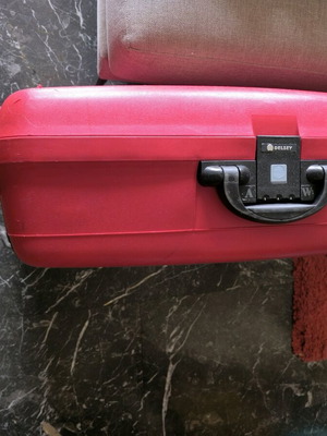 Delsey suitcase like new, large, red, 68x55 cm