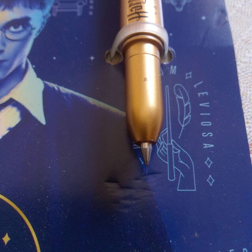 Harry Potter Slytherin gel pen with gold quill design, blue ink