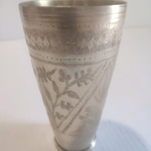 Bronze flower vase used with hand-engraved floral designs