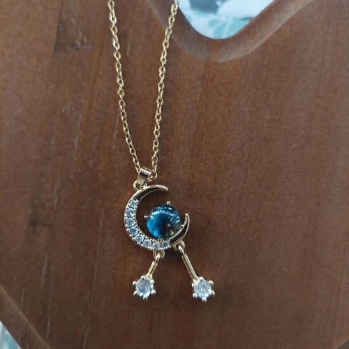Steel necklace with moon and turquoise stone new, gold color