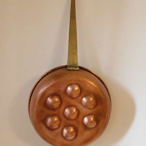 Vintage copper egg pan with 7 slots used