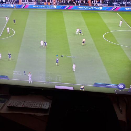 PS4 Pro 1TB console with FIFA 19 game, power cable and controller