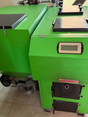 Pellet Boiler like new with external temperature control and hot water mechanism