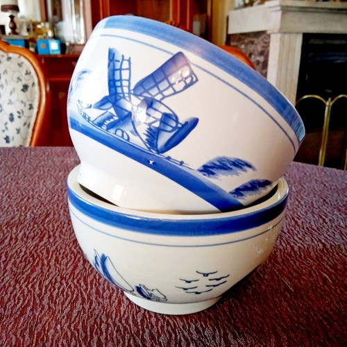 Two flower pots with blue designs