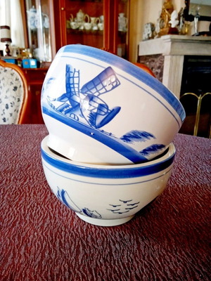 Two flower pots with blue designs