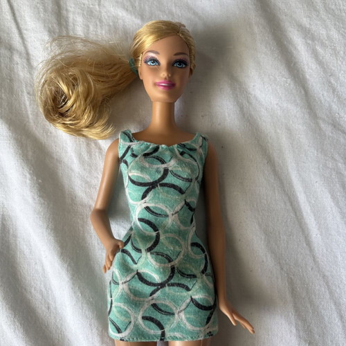 Barbie doll with blue dress