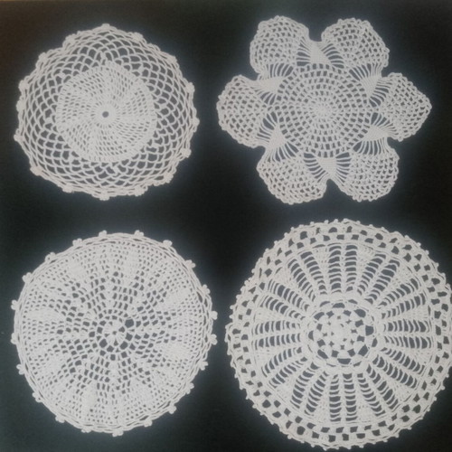 Handmade white doilies like new, set of 4 pieces