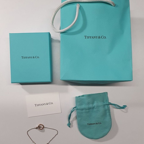 Tiffany & Co Interlocking Circles bracelet in silver and 18K rose gold like new