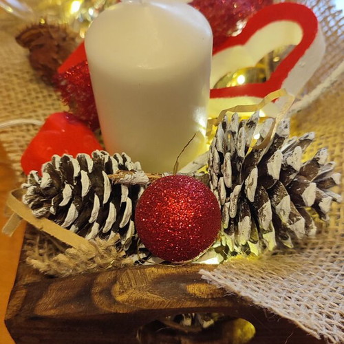 Christmas gift with wooden tray, wine bottle, glasses and decorations