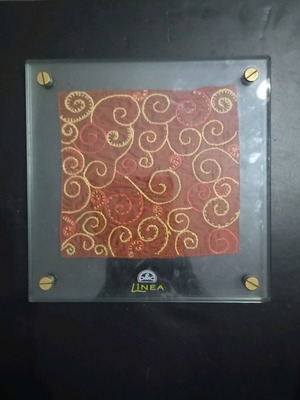 D.M.C promotional item used with framed piece in glass case