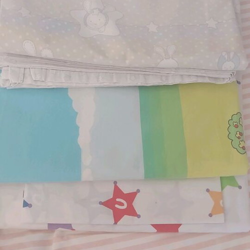 Crib sheets like new, 4 sets of 3 pieces and 3 fitted sheets