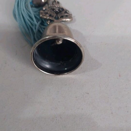Vintage decorative bell like new with blue tassel