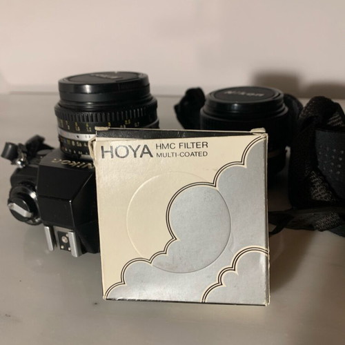 Nikon F-301 with nikkor 50mm 1:1.8 lens and HoyaHMC filter like new