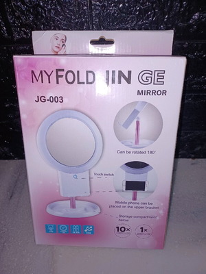 Mirror new with rotating magnifying lens and mobile phone holder