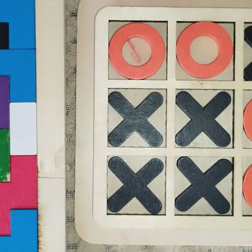 Wooden and magnetic toys used, including plastic mini tic-tac-toe and balls