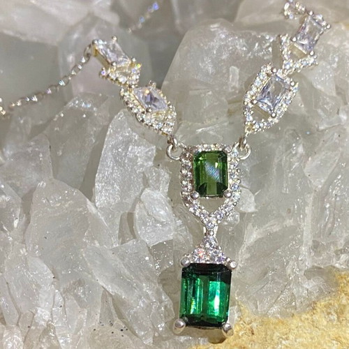 Silver necklace with natural indicolite, green tourmaline, topaz and moissanite