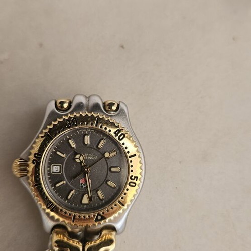 TAG Heuer women's wristwatch used, gray and gold