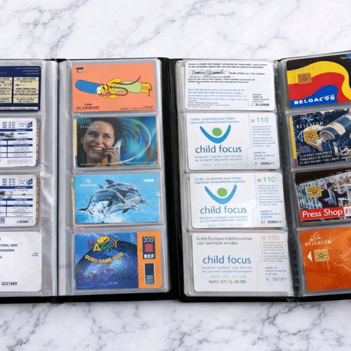 Phone card collection used, 106 pieces with albums