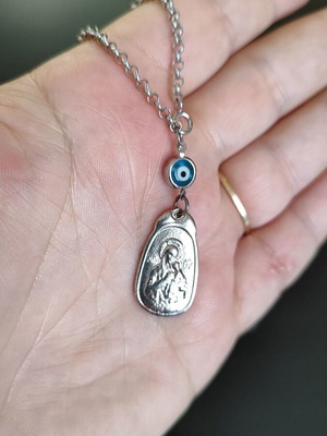 Silver children's bracelet with blue glass evil eye, like new